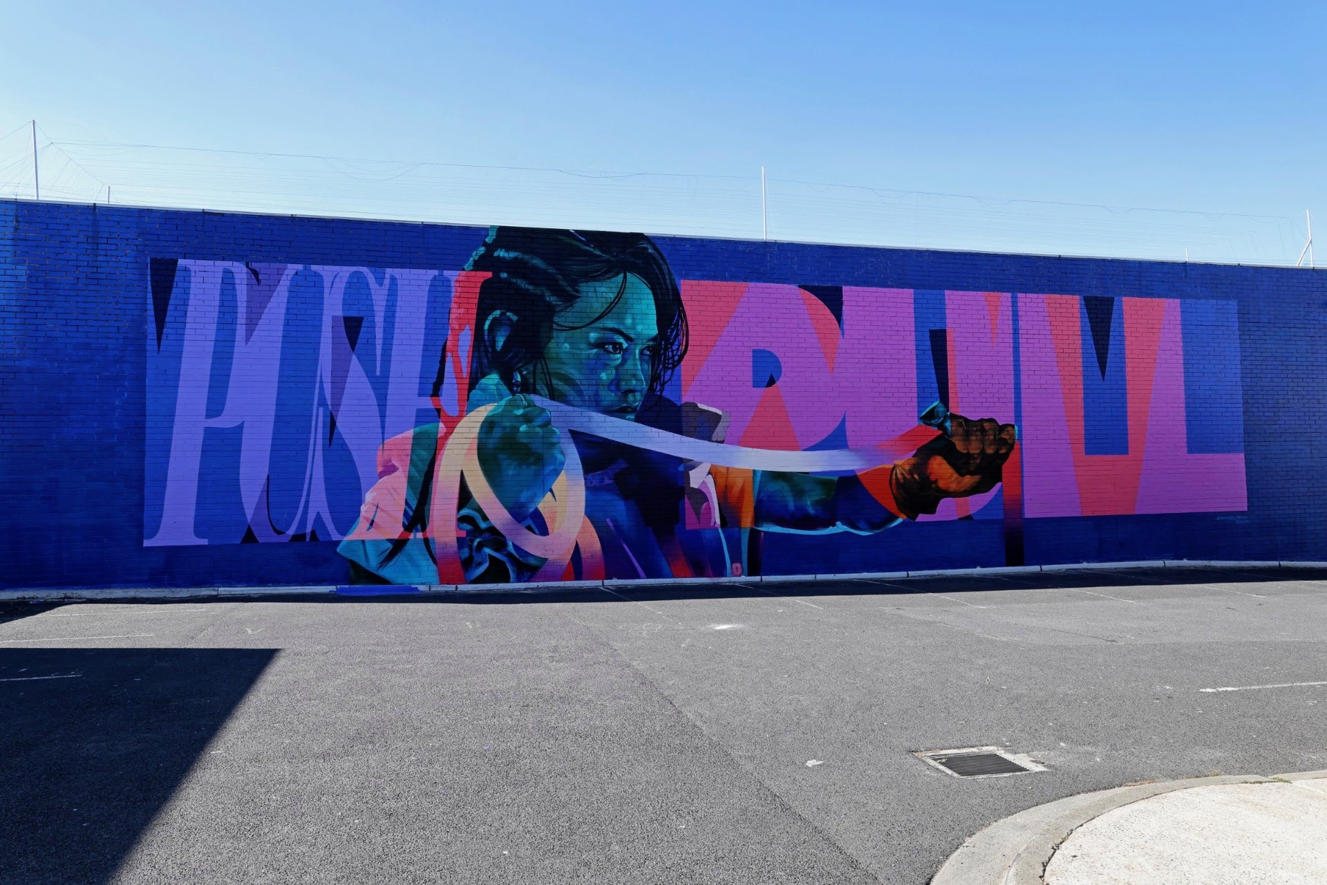 Completed PushPull mural across the full public wall