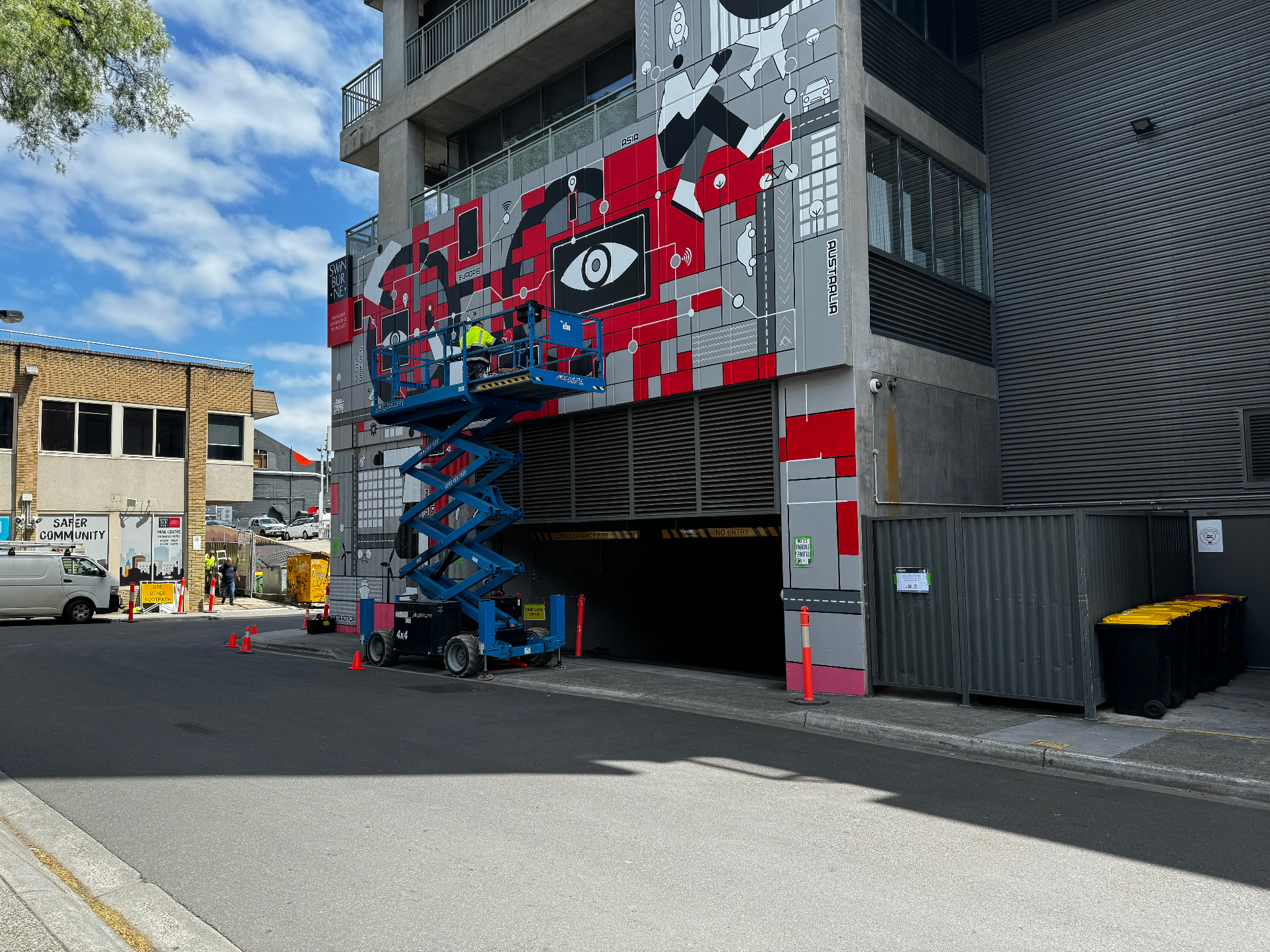 Swinburne mural, installation in progress