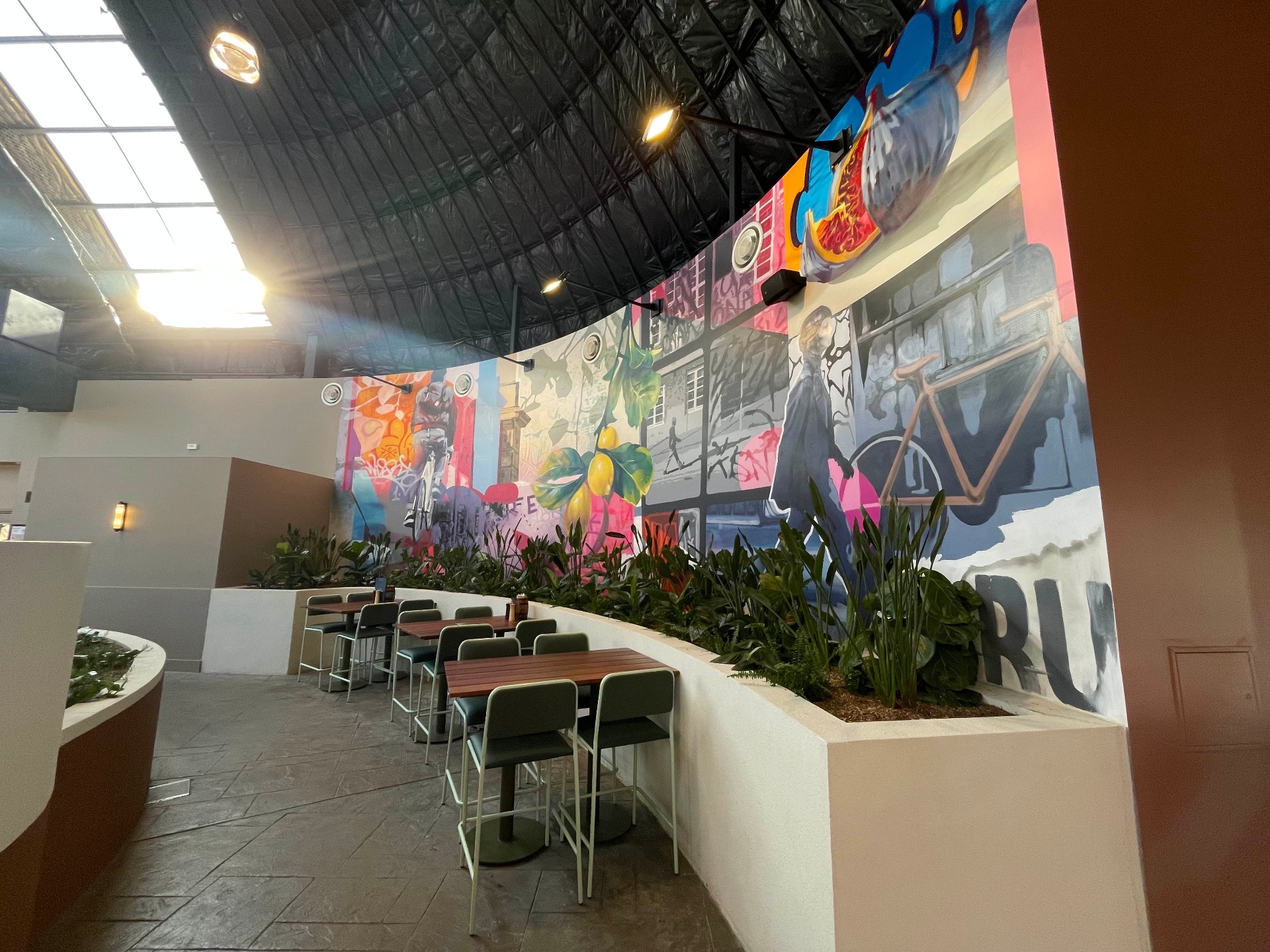Moreland Hotel mural wall with lemons and cyclist