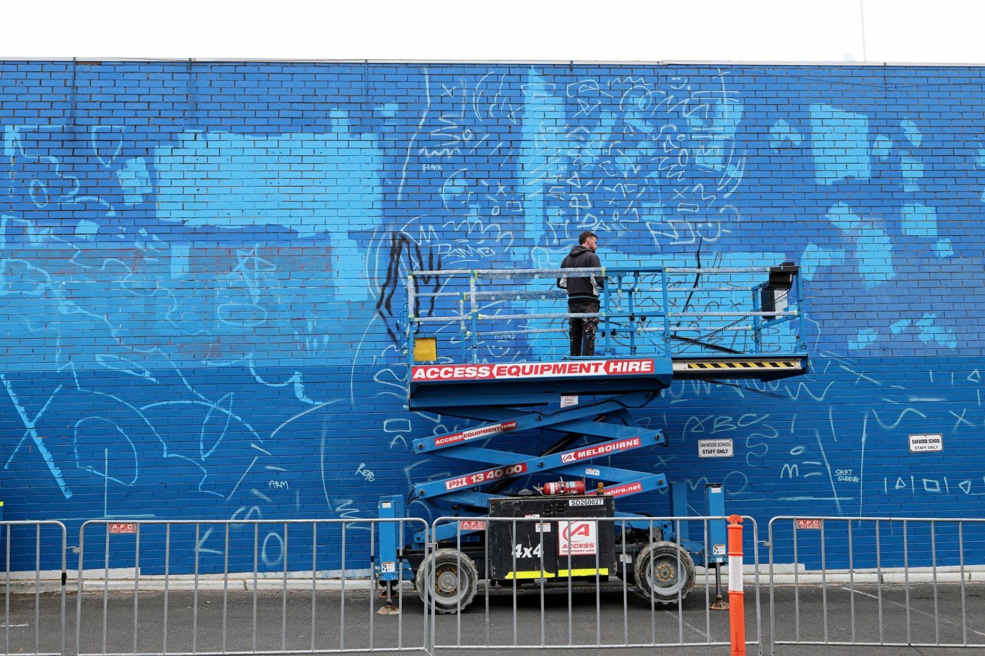 Early linework stage of the PushPull mural