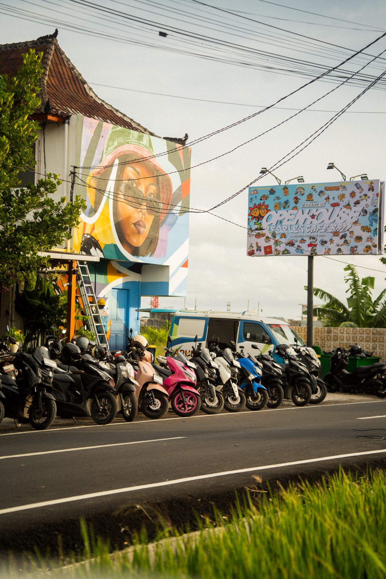 Open House Bali venue with mural and street view