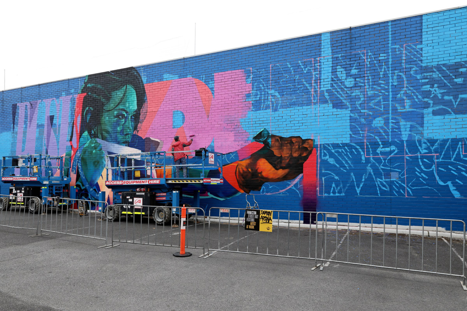 Wide process view of the PushPull mural in progress